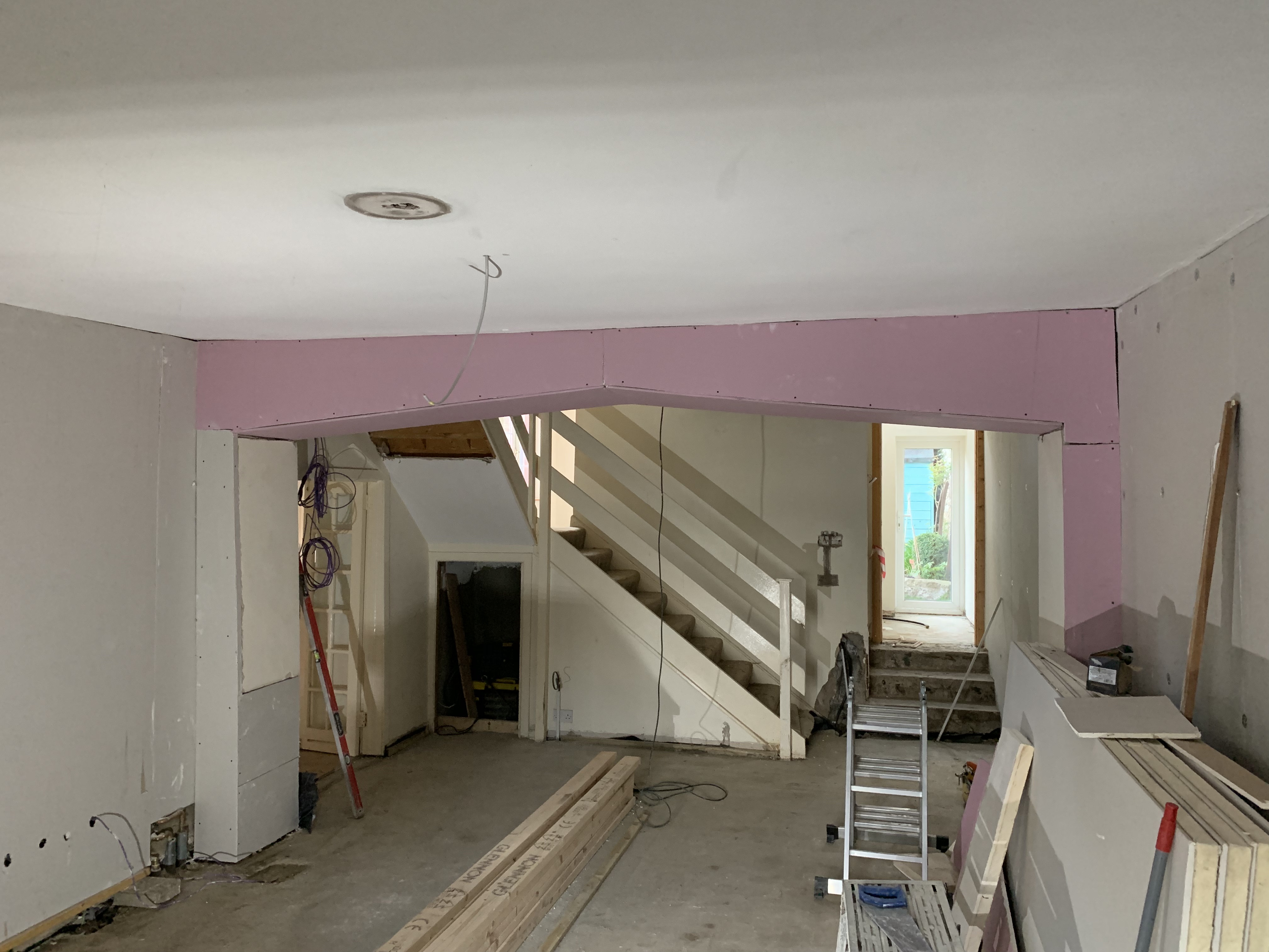 Plasterboard goes up, pipes come down